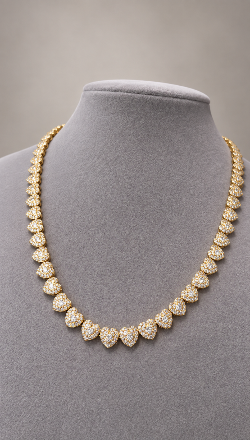 Gold necklace with stone-set heart links